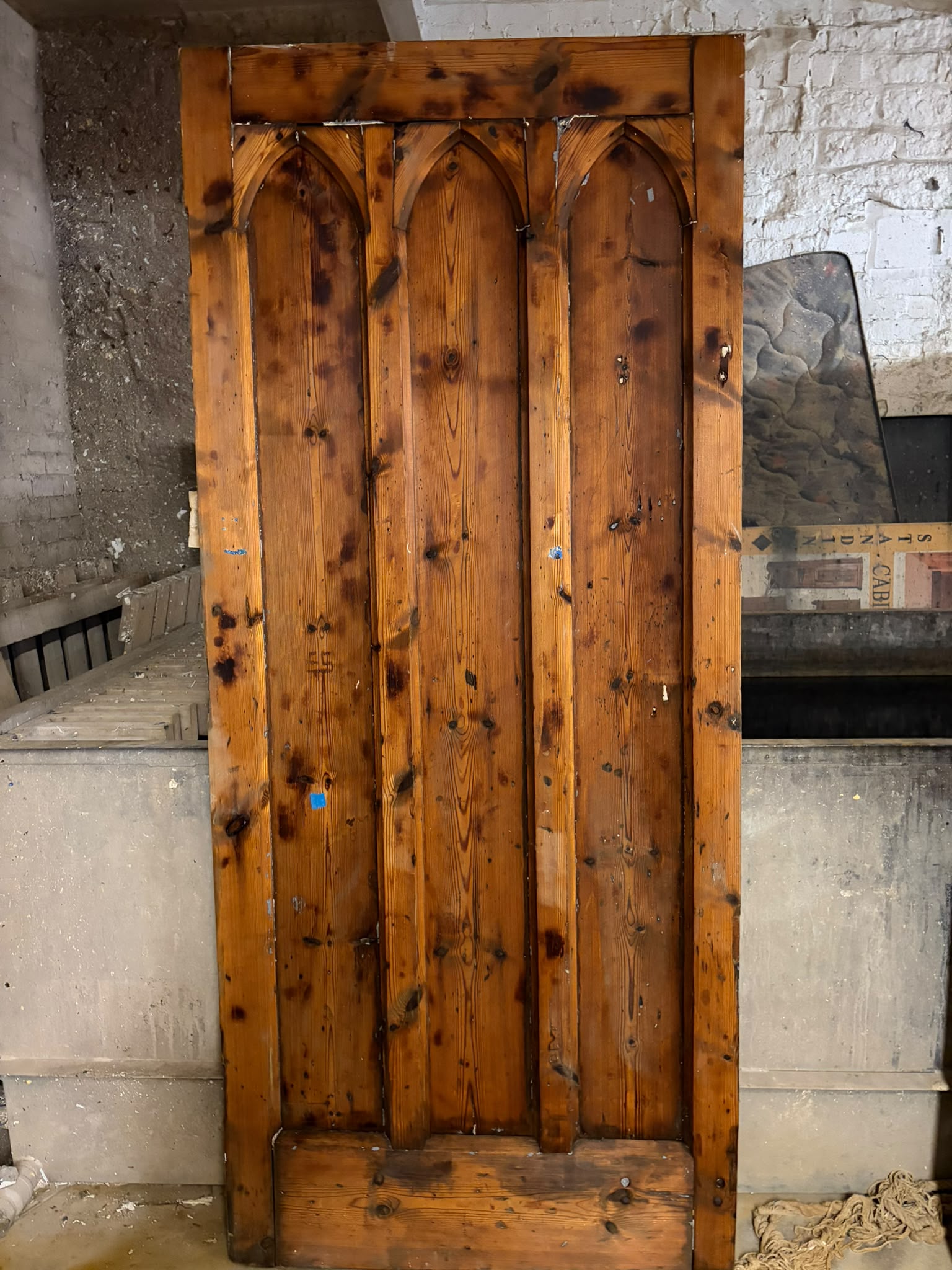 Huge 300-year-old church door from Cheshire stripped back to bare timber by Double Dipper Paint Strippers